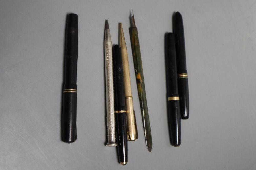 Four small fountain pens including two Swan, an engine turned silver pencil and two other items